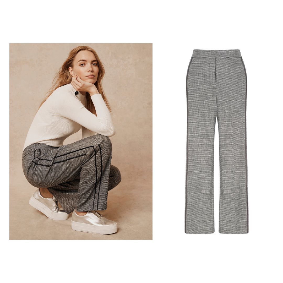 Left: Blonde model crouching down wearing cream roll neck top, grey wide leg trousers and silver platform trainers on beige background. Right: still life image of the same grey checked trousers.